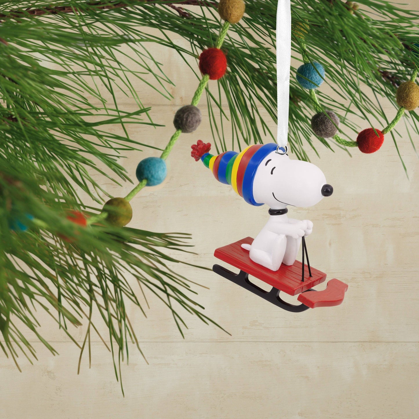 Peanuts Snoopy On Sled Ornament