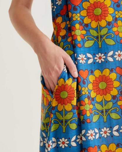 Colorful floral dress with a blue background