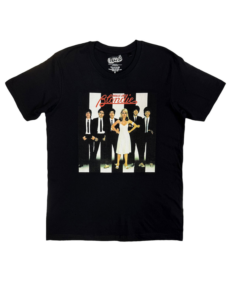 Black t-shirt with a graphic design of Blondie  in a white dress surrounded by men in suits, on a white background.