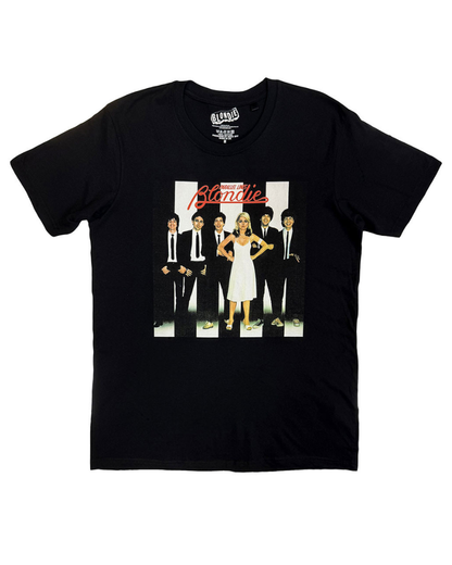 Black t-shirt with a graphic design of Blondie  in a white dress surrounded by men in suits, on a white background.