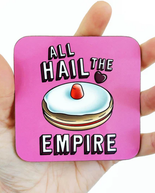 Pink coaster with illustration of empire biscuit reading 'All hail the empire'.