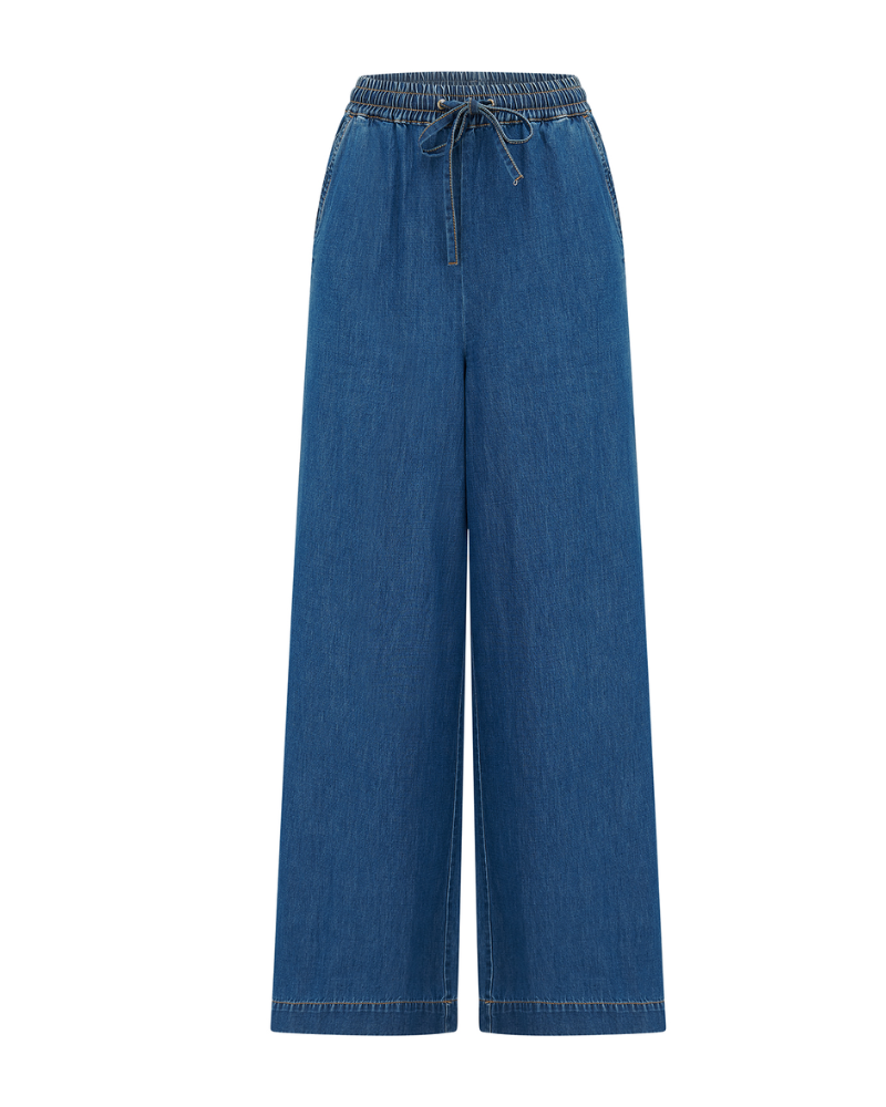 Blue denim pants on a white background