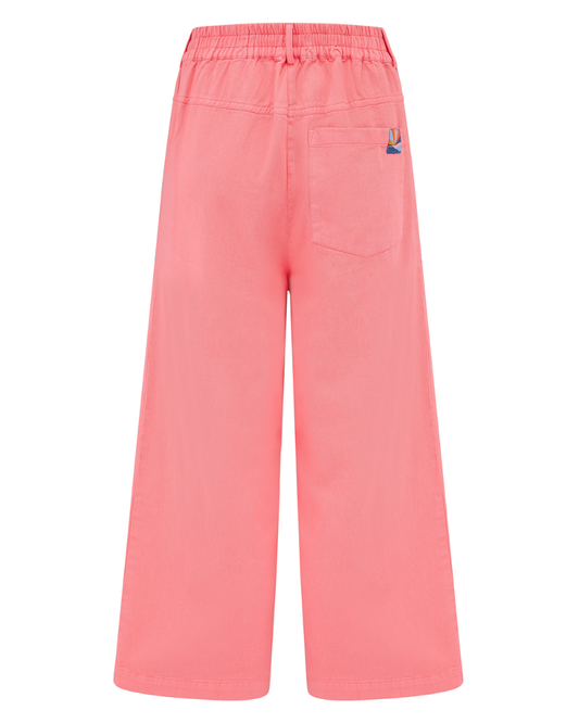 Pink pants with a small logo on a white background